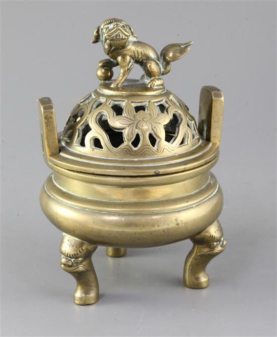 A Chinese bronze ding censer and cover, Xuande mark, late 19th century, height 20.5cm